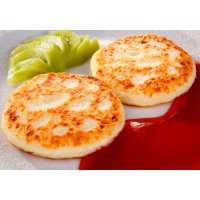 Сверху помещаем куриную грудку на кости